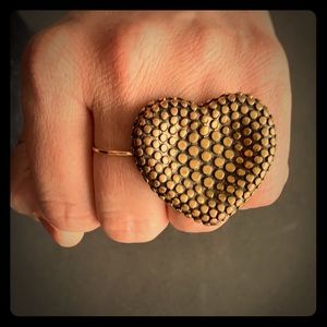 Elastic beaded heart ring.